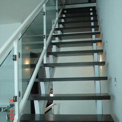Steel stairs with glass panel - Products