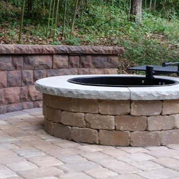 Walkways, retaining walls, patio with fire pit!