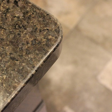 Moline, IL Bath Remodel With Gray Stained Cherry Vanity and Pebble Tiled Shower