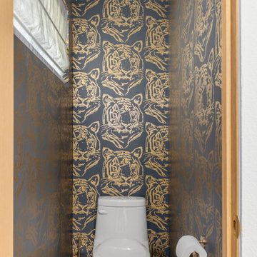 Tiger wallpaper in toilet room — 90s Fixer, Reno interior design by Find Design