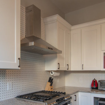 Heart of the Home” Kitchen with marble basket weave mosaic backsplash