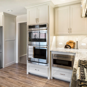 An Expanded 90’s Kitchen with A Neutral Color Scheme
