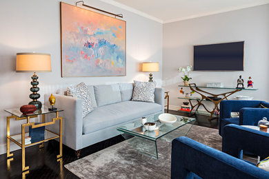Inspiration for a mid-sized modern enclosed dark wood floor living room remodel in New York with gray walls, no fireplace and a wall-mounted tv