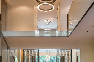 This is an example of a contemporary foyer in Toronto.