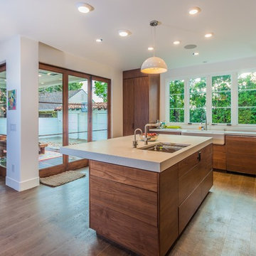 Walnut Kitchen With Island and Farmhouse Sink