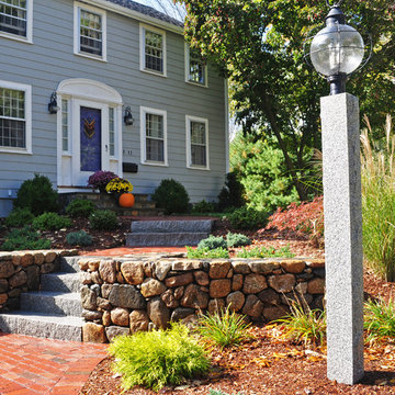 Front Yard Walkway Featuring Woodbury Split Face Steps and Light Post.