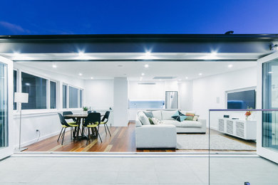 Mid-sized contemporary family room in Sydney.