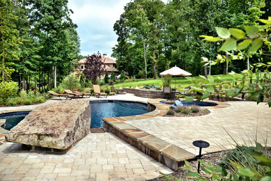 Example of a classic patio design in Charlotte