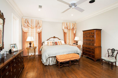 Example of a classic dark wood floor bathroom design in Dallas with beige walls
