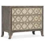 Hooker Furniture - Alfresco Bellissimo Bachelors Chest - In a European provincial silhouette with a Moroccan flair, the Bellissimo Bachelors Chest is adorned with geometric motifs on the front, and a two-tone finish treatment. Pottery, or dark gray, is on the outside of the case, and Light Tusk, or light taupe, is on the drawer fronts. A touch of elegance is added with hand-hammered Florentine gold knob hardware. The three drawers have self-closing undermount drawer guides. In the top drawer is a drop-in felt liner and the bottom drawer is cedar lined. Three-plug electrical outlet.