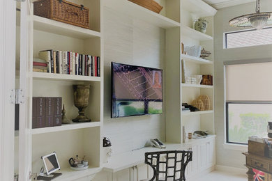 Home office library - 1960s marble floor, coffered ceiling and wallpaper home office library idea in Miami