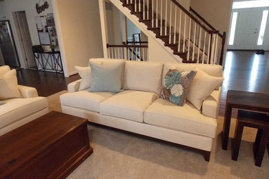 Family room - large contemporary open concept medium tone wood floor and brown floor family room idea in DC Metro with beige walls, a standard fireplace, a plaster fireplace and a tv stand