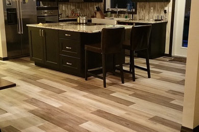 Example of a trendy kitchen design in Calgary