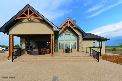 Example of an arts and crafts patio design in Calgary