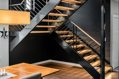 Inspiration for a floating staircase in Boston with wood railing.
