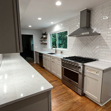 Bright Galley Kitchen with Professional Gas Range