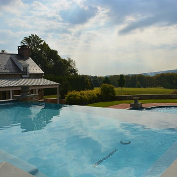 Infinity edge pool with underground grotto