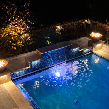 Slope Serenity: Elevated Outdoor Oasis with Hillside Pool