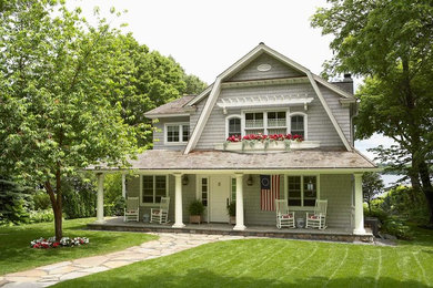 Inspiration for a timeless gray house exterior remodel in Minneapolis