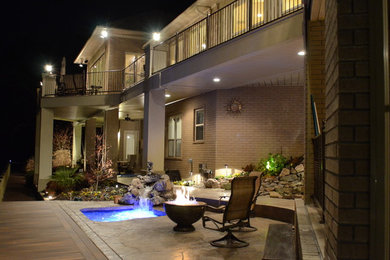 Inspiration for a mid-sized timeless beige two-story brick exterior home remodel in Little Rock