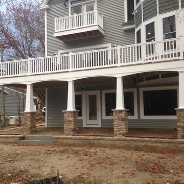 Lakeside patio with stone column bases