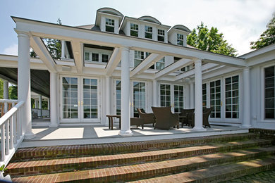 Inspiration for a large coastal white two-story concrete fiberboard house exterior remodel in San Diego with a hip roof and a shingle roof