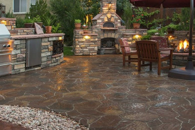 Inspiration for a mid-sized timeless stone patio kitchen remodel in Phoenix with no cover