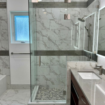 New full euro style shower glass 6Ft door, 8" transom for strength.