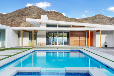 Inspiration for a mid-century modern pool remodel in Other