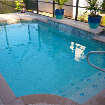 Pavers & Coping With Custom Raised Area With 3 Ft Sheer Descent