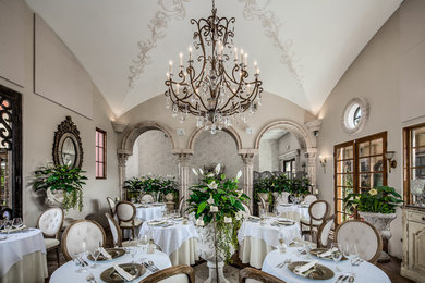Kitchen/dining room combo - large traditional terra-cotta tile kitchen/dining room combo idea in Phoenix with beige walls