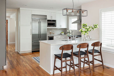 Example of a transitional kitchen design in Seattle