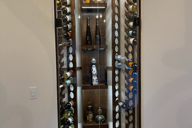Inspiration for a small modern wine cellar remodel in Los Angeles