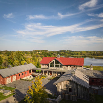 Weathered Gray and Antique Red Barnwood Paneling on Lakeside Farmstead Compound