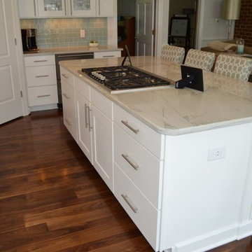 Kitchen Remodel with White Copenhagen Cabinetry and White Macauba Quartzite Tops