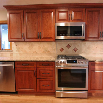 Cherry kitchen with copper accents