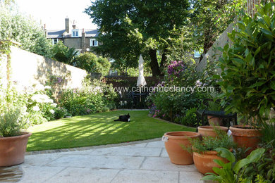 Design ideas for a medium sized traditional garden in London.