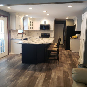 Kitchen remodel—2 toned cabinets with quartz and backsplash