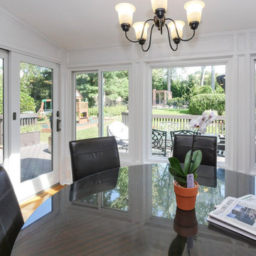 Sun Room Style Kitchen Dinette with All New Windows and Doors - Renewal by Ander