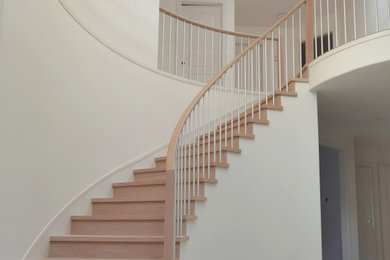 Staircase - mid-sized modern mixed material railing staircase idea in Vancouver