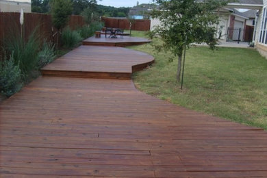 Large elegant backyard deck photo in Austin with no cover