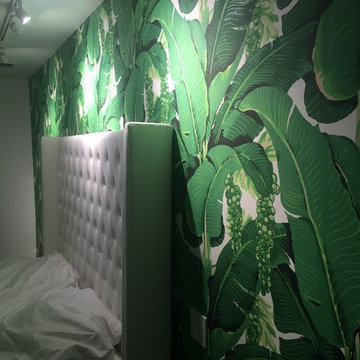 vintage wall-covering installation and flamingo wallpaper