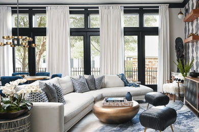Large transitional dark wood floor and wallpaper living room photo in Houston with white walls