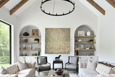 Example of a large transitional formal and open concept dark wood floor, exposed beam and vaulted ceiling living room design in Houston with white walls and no tv