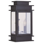 Livex Lighting - Princeton Outdoor Wall Lantern in Bronze - The Princeton collection is a fresh interpretation of the classic English pocket lantern. Hand crafted solid brass  Princeton fixtures are built for lasting beauty. This outdoor wall light features a bronze finish and clear glass. This old world charm is built to last.