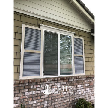 The window shutters on the first and second story Dry Rot Damage Repair
