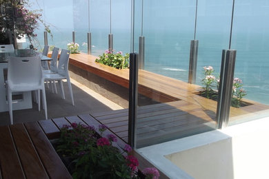 This is an example of a contemporary porch design in Other.