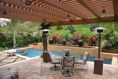 Elegant custom-shaped pool photo in Los Angeles