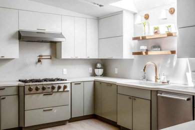 Example of a mid-sized minimalist l-shaped kitchen design in Miami