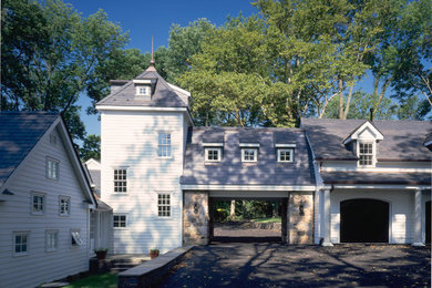 Inspiration for a large traditional three-storey white exterior in Philadelphia with wood siding and a gable roof.